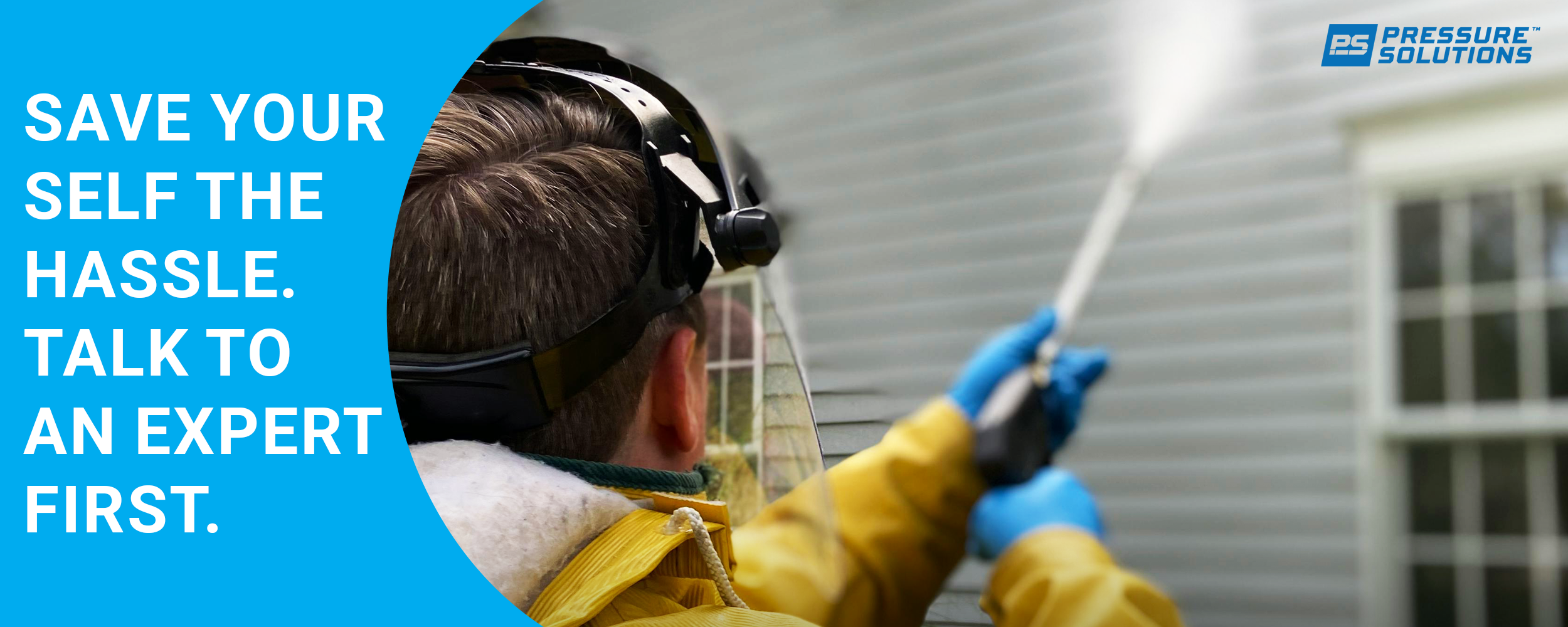 An image of a professional pressure washing the siding of a house